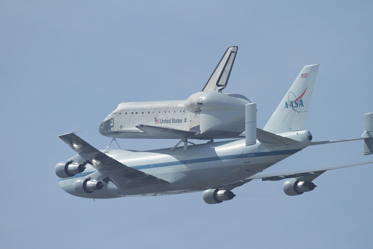 Space Shuttle Endeavour departs Moffett Field