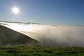 Monument Peak surrounded by low fog