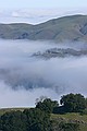 Monument Peak surrounded by low fog