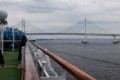 Diamond Princess sailing under the Yokohama Bay Bridge